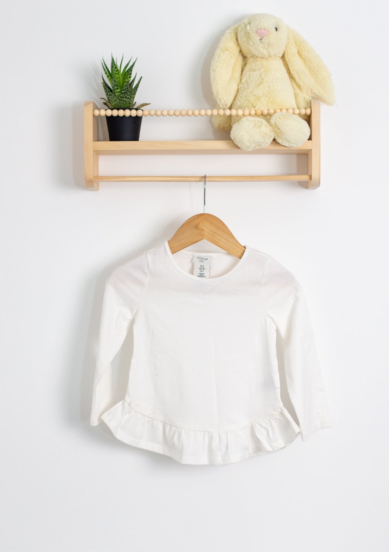 Aspen 2T White Peplum Top