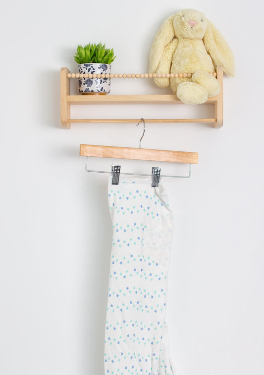 Aden and Anais 4-6M White with blue and green accents swaddle